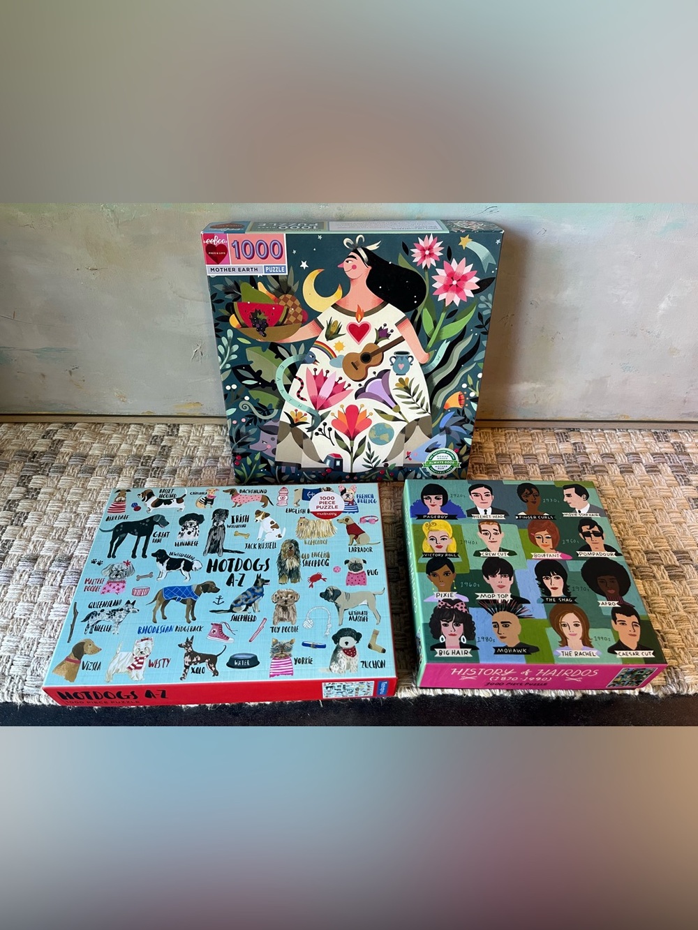 Three 1000-Piece Jigsaw Puzzles-"Mother Earth" + Hot Dogs + History of Hairdos